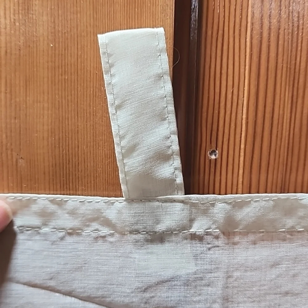 4 Sheer tan curtain panels with button loop top